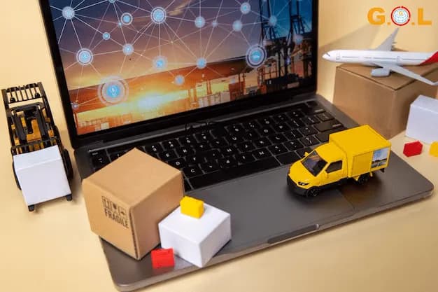 truck-and-box-toy-next-to-computer